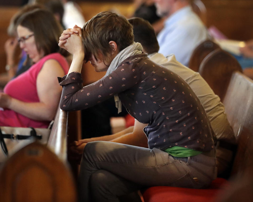 Cary Gibson prays during a vigil at Fisk University to protest the execution of Billy Ray Irick Thursday, Aug. 9, 2018, in Nashville, Tenn. Tennessee carried out the execution of Irick, condemned for the 1985 rape and murder of a 7-year-old girl, marking the first time the state has applied the death penalty since 2009. (AP Photo/Mark Humphrey)