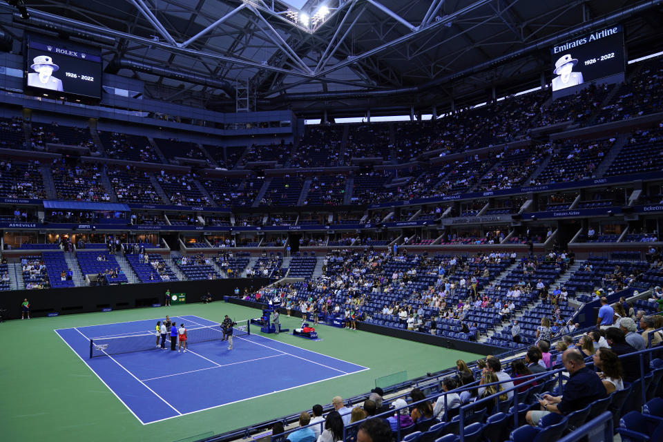 A moment of silence is observed for Queen Elizabeth II ahead of a match between Caroline Garcia, of France, and Ons Jabeur, of Tunisia, during the semifinals of the U.S. Open tennis championships, Thursday, Sept. 8, 2022, in New York. (AP Photo/Matt Rourke)