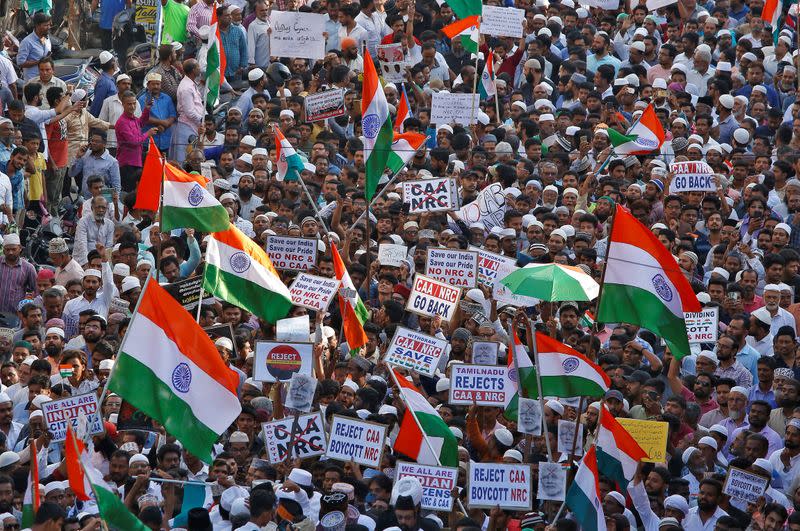 Demonstrators attend a protest march against a new citizenship law, in Chennai