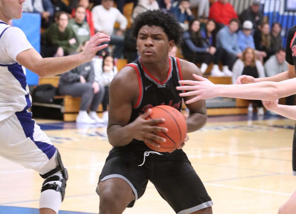 North Rockland's Elijah Barclay fights for space in the paint during a game at Pearl River Jan. 24, 2024. North Rockland won 44-42.