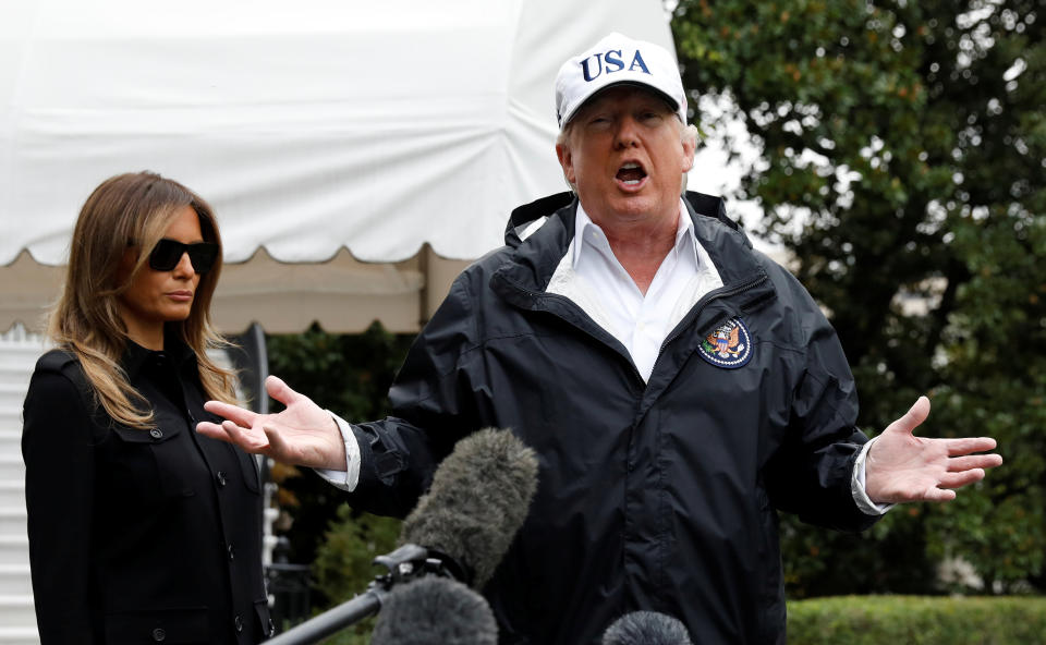 <p>President Donald Trump speaks to reporters as he and First Lady Melania Trump depart the White House in Washington on their way to view storm damage in Fla., Sept.14, 2017. (Photo: Kevin Lamarque/Reuters) </p>