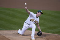 Oakland Athletics starting pitcher Chris Bassitt works in the first inning of a baseball game against the San Francisco Giants, Friday, Sept. 18, 2020, in Oakland, Calif. (AP Photo/Eric Risberg)