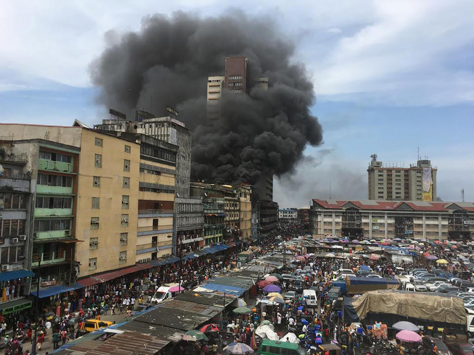 Smoke rises from a fire in downtown Lagos, Nigeria, Tuesday, Nov. 5, 2019. (Photo: Sunday Alamba/AP)