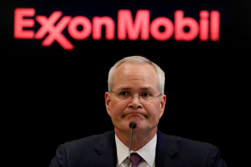 FILE PHOTO: Darren Woods, Chairman & CEO of Exxon Mobil Corporation speaks during a news conference at the NYSE