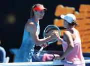 Tennis - Australian Open - Fourth Round - Melbourne Park, Melbourne, Australia, January 20, 2019. Australia's Ashleigh Barty shakes hands with Russia's Maria Sharapova after winning the match. REUTERS/Lucy Nicholson