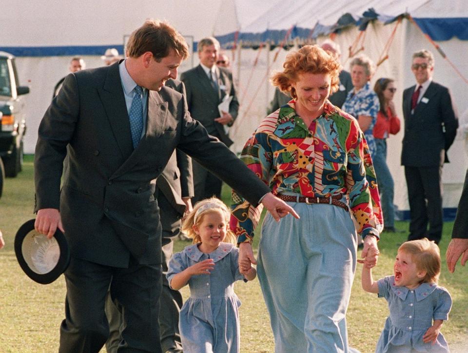 Sarah Ferguson with Prince Andrew and their children, Eugenie and Beatrice, in 1992, on their first public outing since announcing their separation (AFP via Getty)