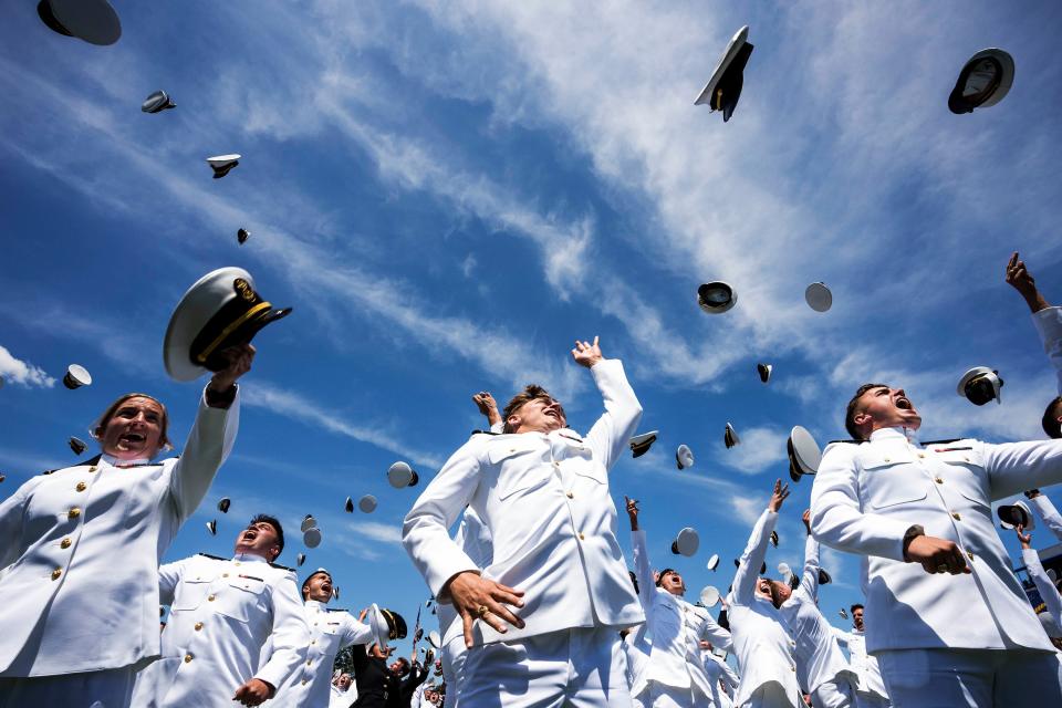 May 26, 2023: Graduating Midshipmen toss their hats in the air at the conclusion of the U.S. Naval Academy Graduation and Commissioning Ceremony at the Naval Academy May 26, 2023 in Annapolis, Maryland. The 2023 graduating class of 1,018 Midshipmen will be commissioned as ensigns in the Navy or second lieutenants in the Marine Corps.