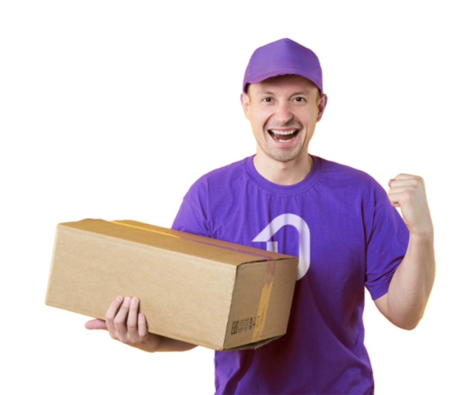 A man in purple shirt and hat pumps his fish with a package in other hand