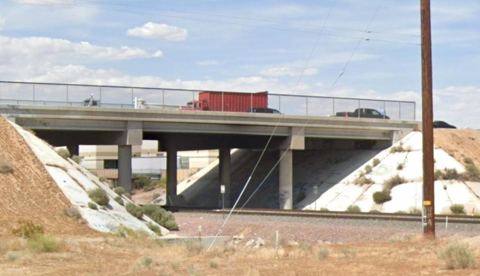 A train bridge along Bear Valley Road, just east of Industrial Boulevard, in Victorville, as pictured in a Google Street View image.