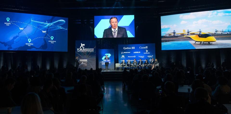 Quebec Premier Francois Legault speaks at the International Aerospace Innovation Forum in Montreal, Tuesday, May 21, 2024.  Quebec Premier François Legault says the government will inject an additional $85 million in funding to help launch the aerospace hot spot, with drones and decarbonization as key areas of research and commercialization. THE CANADIAN PRESS/Christinne Muschi