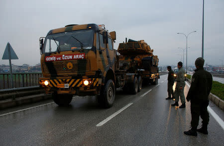 A Turkish military convoy arrives at an army base in the border town of Reyhanli near the Turkish-Syrian border in Hatay province, Turkey January 17, 2018. REUTERS/Osman Orsal