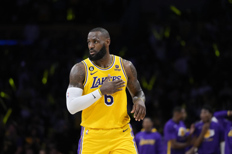 Los Angeles Lakers' LeBron James watches play during the first half in Game 6 of the team's first-round NBA basketball playoff series against the Memphis Grizzlies on Friday, April 28, 2023, in Los Angeles. (AP Photo/Jae C. Hong)