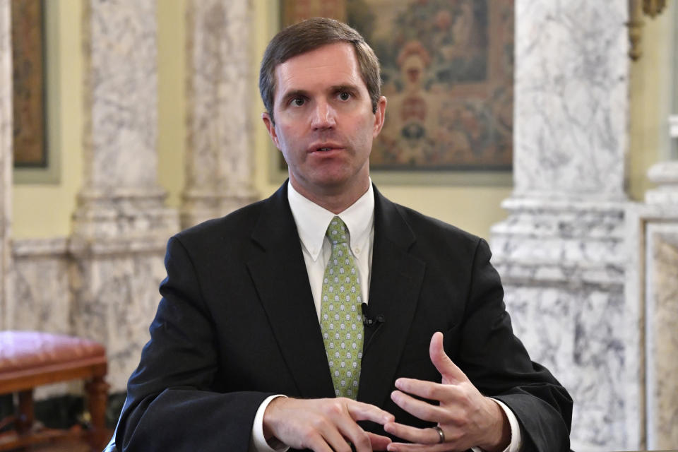 Kentucky Gov.-elect Andy Beshear answers questions during an interview in the State Reception Room at the Kentucky State Capitol in Frankfort, Ky., Friday, Nov. 22, 2019. (AP Photo/Timothy D. Easley)