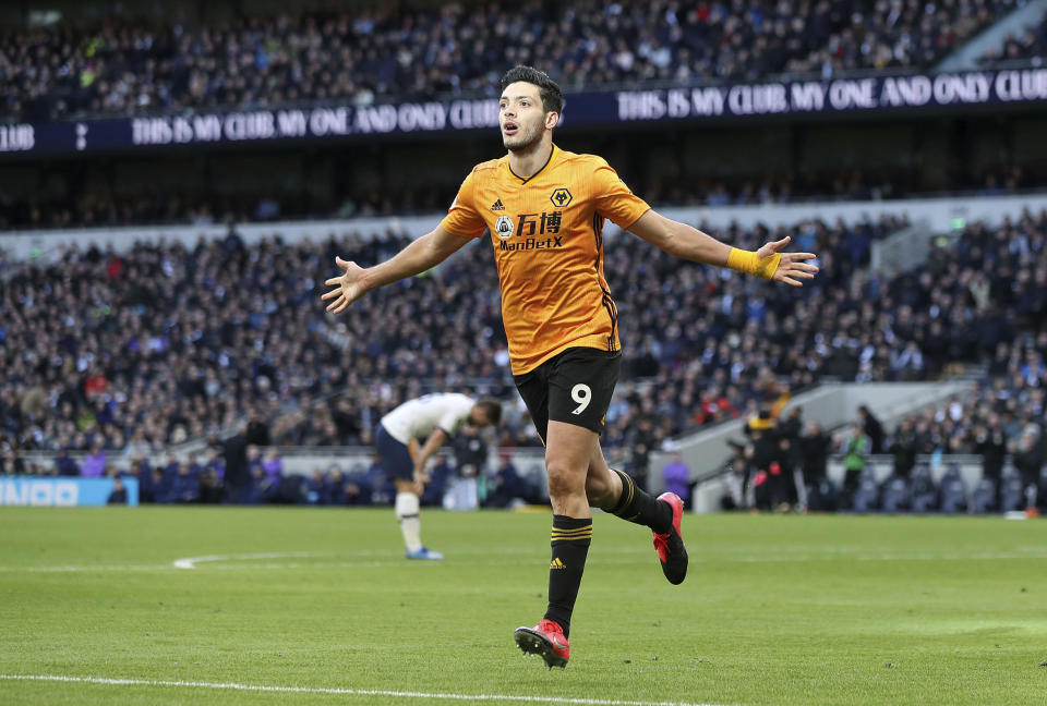 Wolverhampton Wanderers' Raul Jimenez celebrates scoring his side's third goal of the game during the English Premier League soccer match between Tottenham and Wolverhampton Wanderers at the Tottenham Hotspur Stadium, London, Sunday, March 1, 2020. (Bradley Collyer/PA via AP)