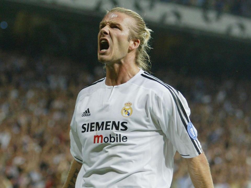 David Beckham of Real Madrid celebrates after the first goal during the UEFA Champions League Group F match between Real Madrid and Olympic Marseille at the Santiago Bernabeu Stadium on September 16, 2003 in Madrid, Spain.