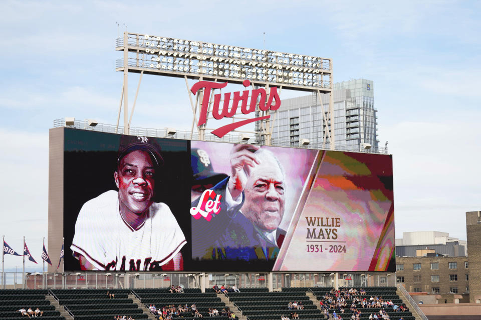 A tribute to Baseball Hall of Fame Willie Mays is displayed on the video board during a baseball game between the Tampa Bay Rays and Minnesota Twins, Wednesday, June 19, 2024, in Minneapolis. (AP Photo/Abbie Parr)