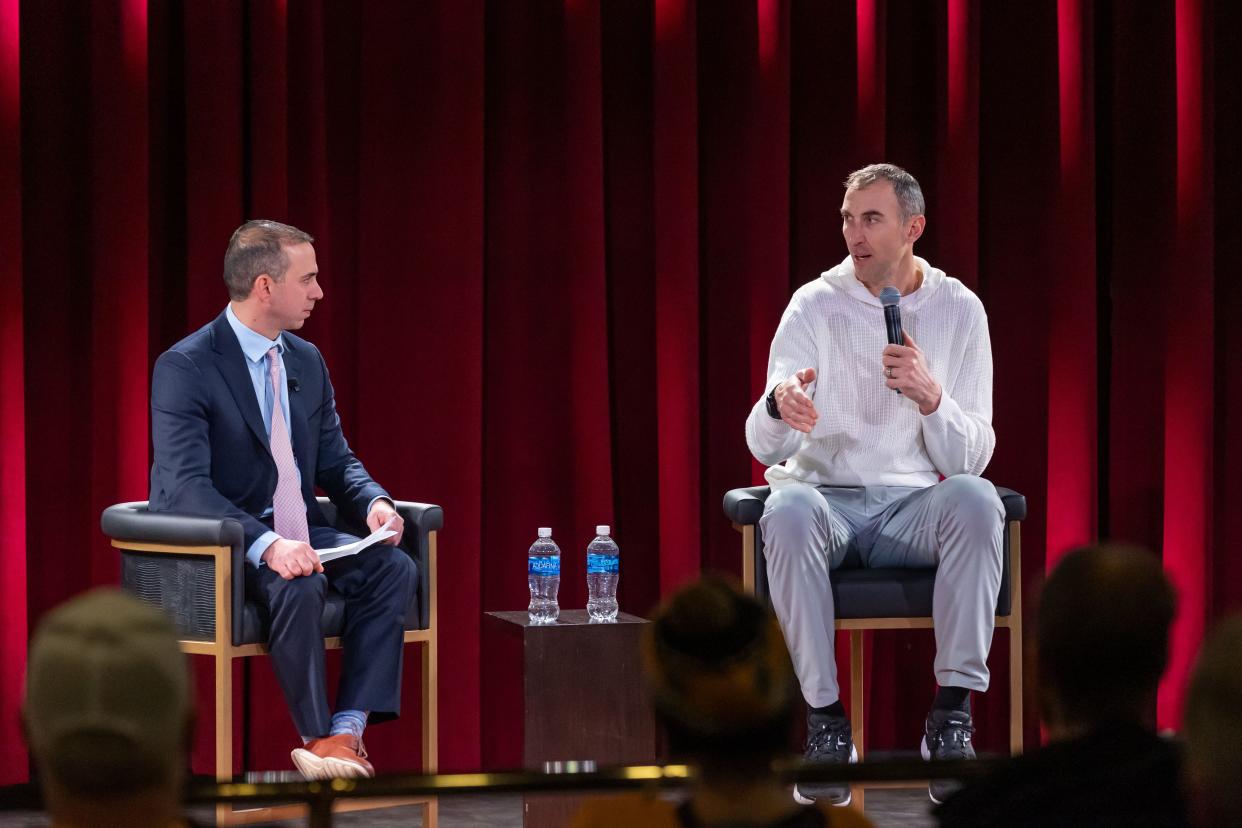 Master of Ceremonies Mike Mutnansky left, talks with Boston Bruins legend Zdeno Chara during Thursday's free question-and-answer event in the Seasons Showroom at The Brook in Seabrook. The event was in conjunction with The Brook, DraftKings and the New Hampshire Lottery.