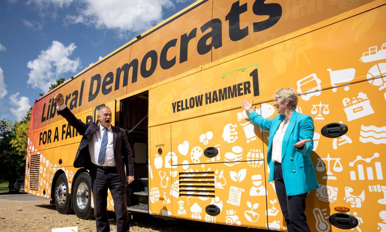 <span>Ed Davey with Pippa Heylings, the Lib Dem candidate for the South Cambridgeshire constituency, at the party’s launch event in Whittlesford.</span><span>Photograph: Jack Taylor/Getty Images</span>