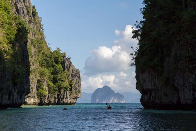 <strong>El Nido, Palawan.</strong> Dubbed as one of the best beach and island destinations in the Philippines by CNNGo, El Nido is blessed with amazing views you want to wake up to every day—eye-popping limestone formations rising out of unbelievable clear waters, romantic lagoons, and virgin forests. You can easily forget the time and spend your days snorkelling, kayaking, or sunbathing on one of its several deserted white beaches.