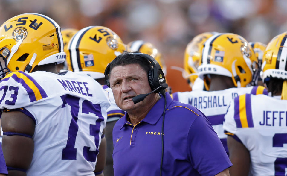 LSU Tigers head coach Ed Orgeron huddles with the team during a timeout in the game against the Texas Longhorns Saturday Sept. 7, 2019 at Darrell K Royal-Texas Memorial Stadium in Austin, Tx. ( Photo by Edward A. Ornelas )