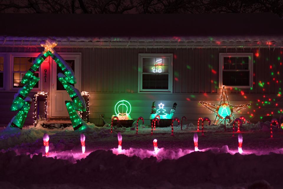 “Candy Cane Lane” is filled with houses showing off Christmas lights on Day Avenue on Friday, December 9, 2022, in Sioux Falls.