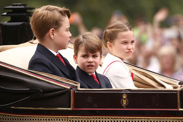 <p>HENRY NICHOLLS/AFP via Getty </p> Prince George, Prince Louis and Princess Charlotte