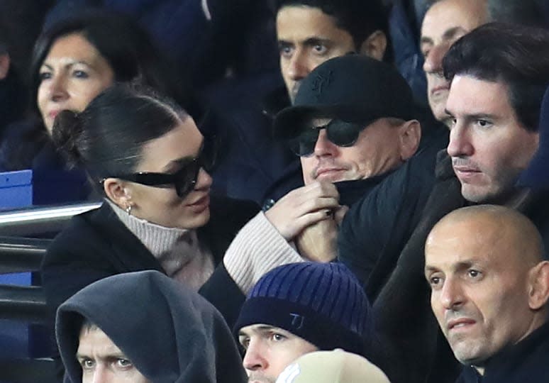 <div class="inline-image__caption"><p>"Leonardo DiCaprio and girlfriend Cami Morrone in the stands during the UEFA Champions League, Group C match at the Parc des Princes, Paris. </p></div> <div class="inline-image__credit">Mike Egerton/PA Images/Getty</div>