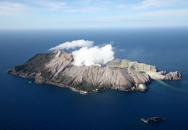 <p>Phil Walter/Getty Images</p> White Island is pictured on December 08, 2020 off the coast of Whakatane