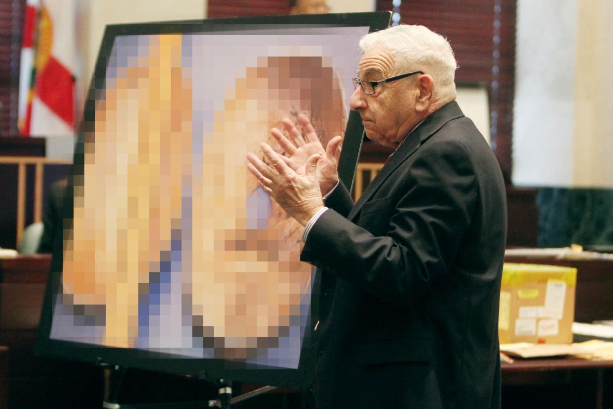 Forensic expert Dr. Werner Spitz testifies in the trial of Casey Anthony, talking about autopsy results of the remains of Anthony's daughter Caylee, at the Orange County Courthouse in Orlando, Florida June 18, 2011. (EDITOR'S NOTE: Per instruction from the court, the portion of the photo showing the skull of Caylee Anthony has been digitally obscured.) REUTERS/Red Huber/Pool (UNITED STATES - Tags: CRIME LAW)