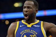 Golden State Warriors forward Draymond Green reacts in the first half during Game 1 of a second-round NBA basketball playoff series against the Memphis Grizzlies, Sunday, May 1, 2022, in Memphis, Tenn. (AP Photo/Brandon Dill)