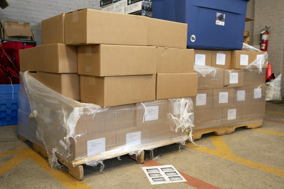 Boxes of 80-lbs paper ready to use in future elections are seen in Wilkes-Barre, Pa., Wednesday, Sept. 13, 2023. (AP Photo/Sait Serkan Gurbuz)