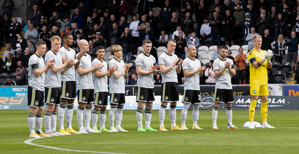 Celtic players, pictured here taking part in a minute's applause for Queen Elizabeth II.