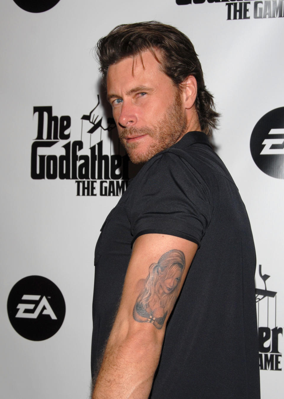 Dean McDermott with Tori Spelling tattoo (Photo by Mark Sullivan/WireImage)