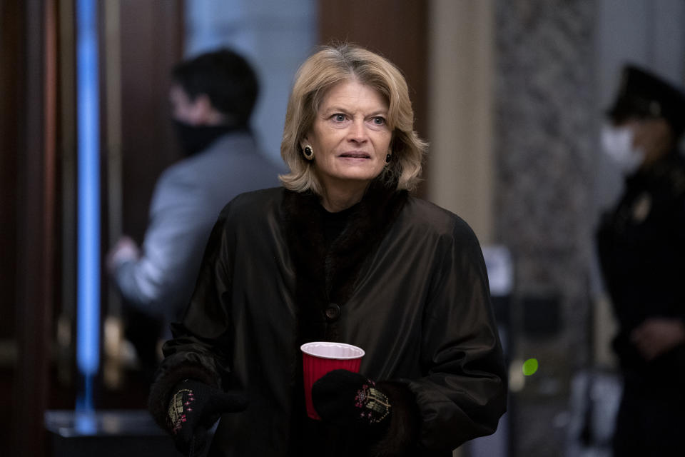 FILE - In this Feb. 13, 2021, file photo, U.S. Sen. Lisa Murkowski, R-Alaska, arrives at the start of the fifth day of the second impeachment trial of former President Trump at the Capitol in Washington. The Alaska Republican Party has not only censured Murkowski for voting to convict former President Donald Trump in his impeachment trial, but it also does not want her to identity as a GOP candidate in next year's election, a member of the party's State Central Committee said Tuesday, March 16, 2021. (Stefani Reynolds/Pool Photo via AP, File)