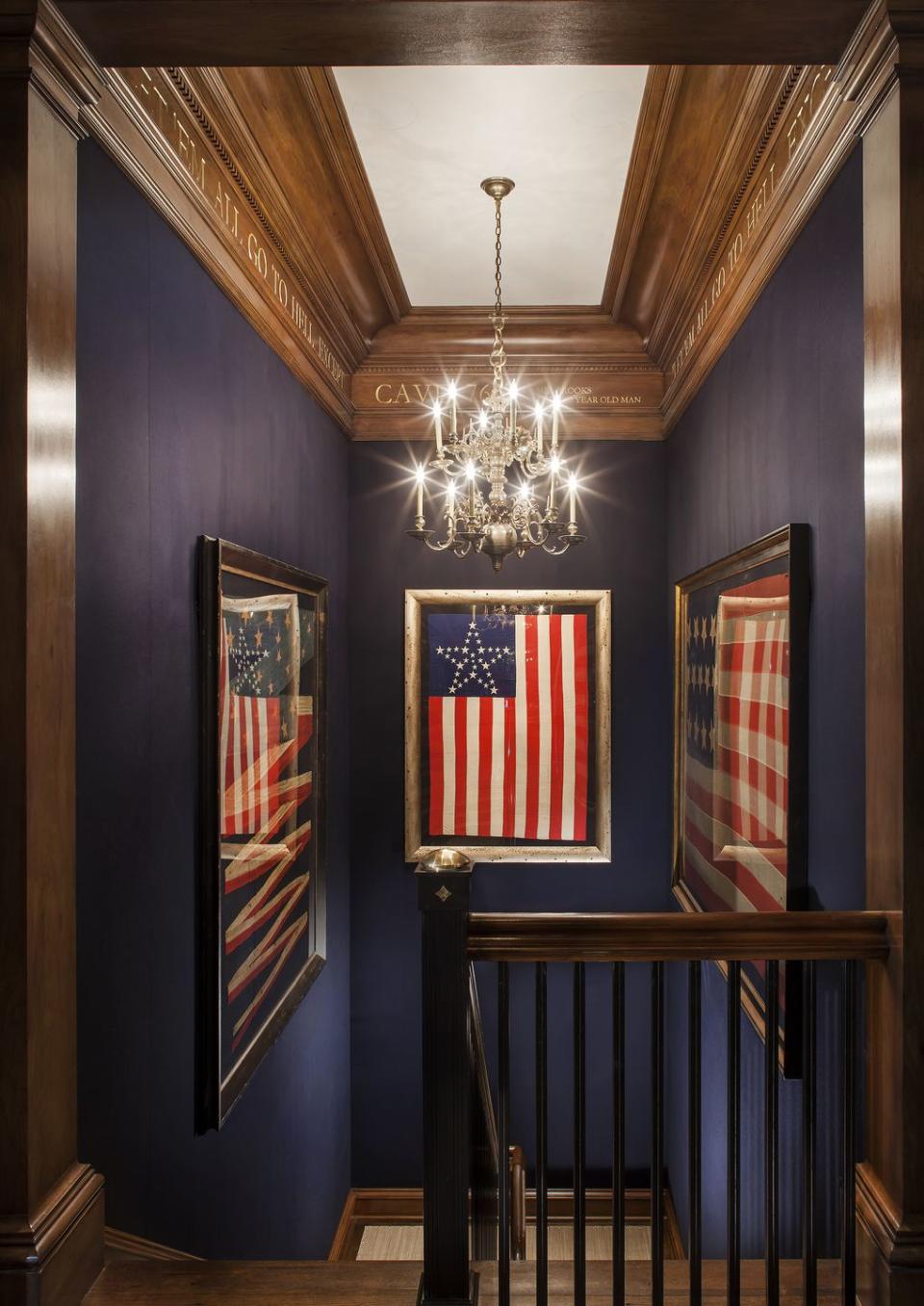 Greenwich stair hall with an American Flag