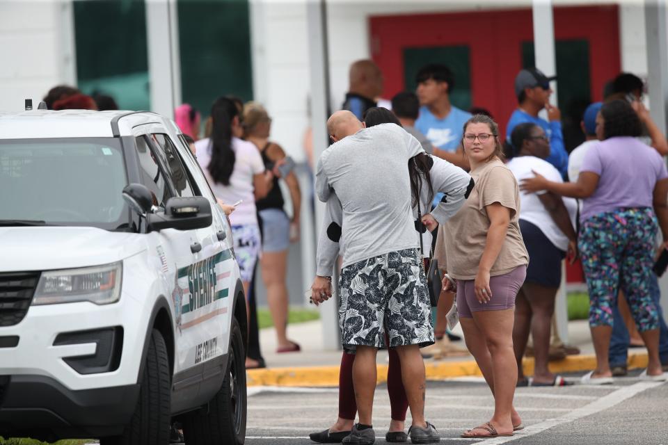 Students and parents reunite at South Fort Myers High School after a threat of a gun was called in Friday afternoon. Lee County SheriffÕs Office declared that there was no active shooter after officers searched the school. It was declared a ÒswattingÓ incident.  