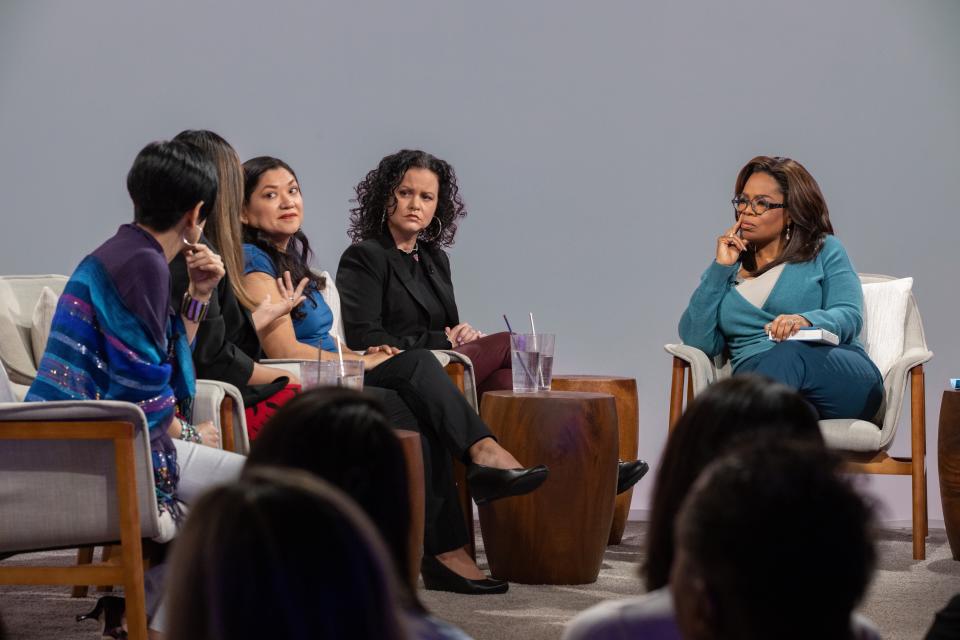 Oprah Winfrey (right) hosts a taping of "Oprah's Book Club" with Jeanine Cummins, author of "American Dirt" (second right), and panelists (from left) Esther J. Cepeda, Julissa Arce and Reyna Grande in Tuscon, Ariz, on Feb. 13.