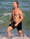 <p>Diplo goes for a dip in the ocean in Miami on Sunday.</p>