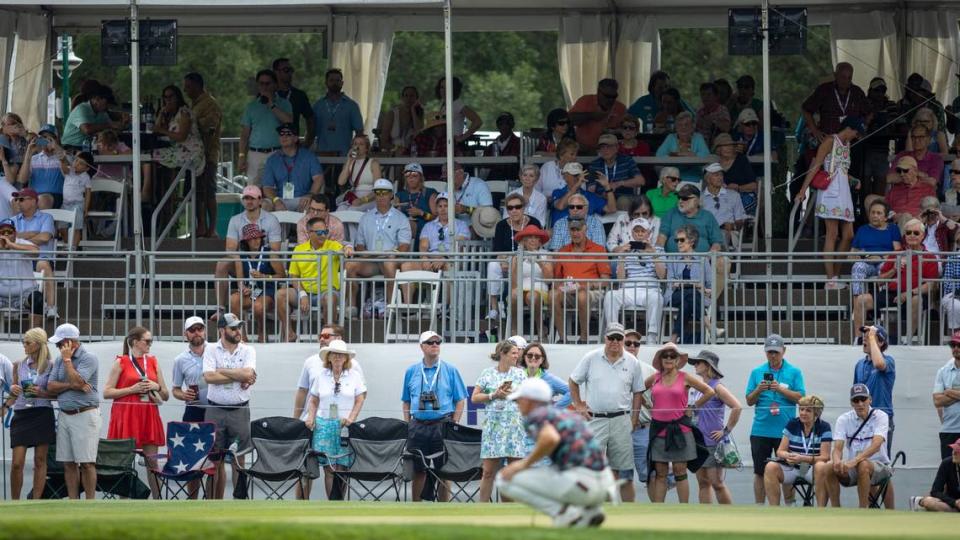Spectators stop and watch Jordan Spieth preparing to putt on the 14th green during the third round of the RBC Heritage Presented by Boeing at Harbour Town Golf Links on Saturday, April 20, 2024 in Sea Pines on Hilton Head Island.