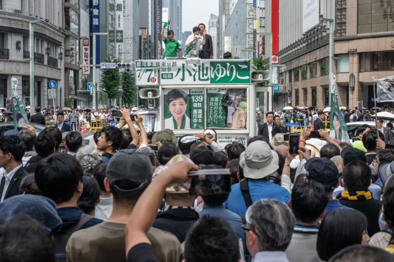 Polls suggest Tokyo governor Yuriko Koike (C at a campaign rally Saturday) will win a third term running the Japanese capital (Yuichi YAMAZAKI)