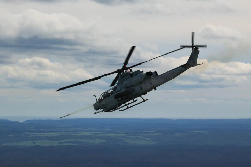 A U.S. Marine Corps AH-1Z Viper with Marine Light Attack Helicopter Squadron 469 fires at a target during Resolute Dragon 22 at Yausubetsu Maneuver Area, Hokkaido, Japan, Oct. 6, 2022. <em>U.S. Marine Corps photo by Cpl. Lorenzo </em>Ducato