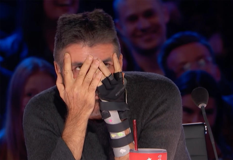 Simon Cowell was shocked at the deepfake technology that made him look like a pop star. (America's Got Talent / YouTube)
