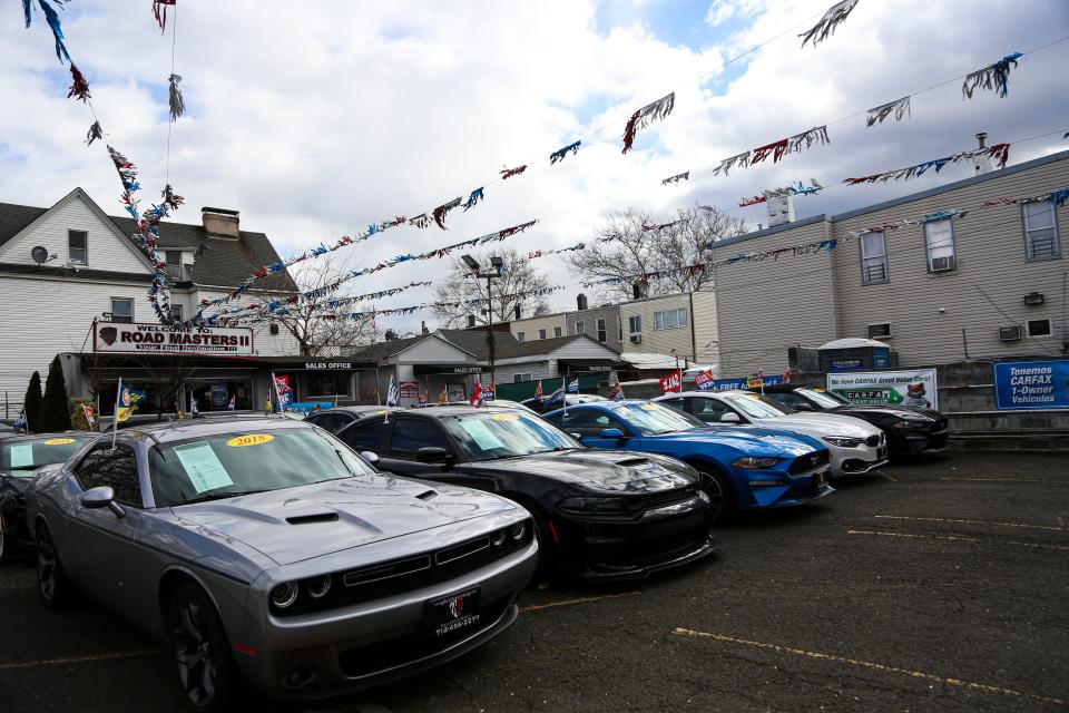 Used car lot with muscle cars