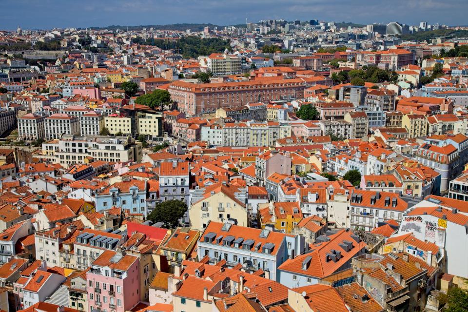 Cityscape of rooftops in Lisbon, Portugal showing red rooftops.

Lisbon (Portuguese: Lisboa) is the capital and largest city of Portugal, with an estimated population of 548,703 within its administrative limits in an area of 100.05 km2.