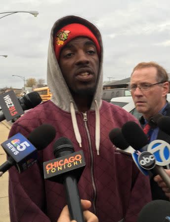 Pierre Stokes, father of 9-year-old shooting victim Tyshawn Lee, speaks to reporters in Chicago November 5, 2015. REUTERS/Mary Wisniewski