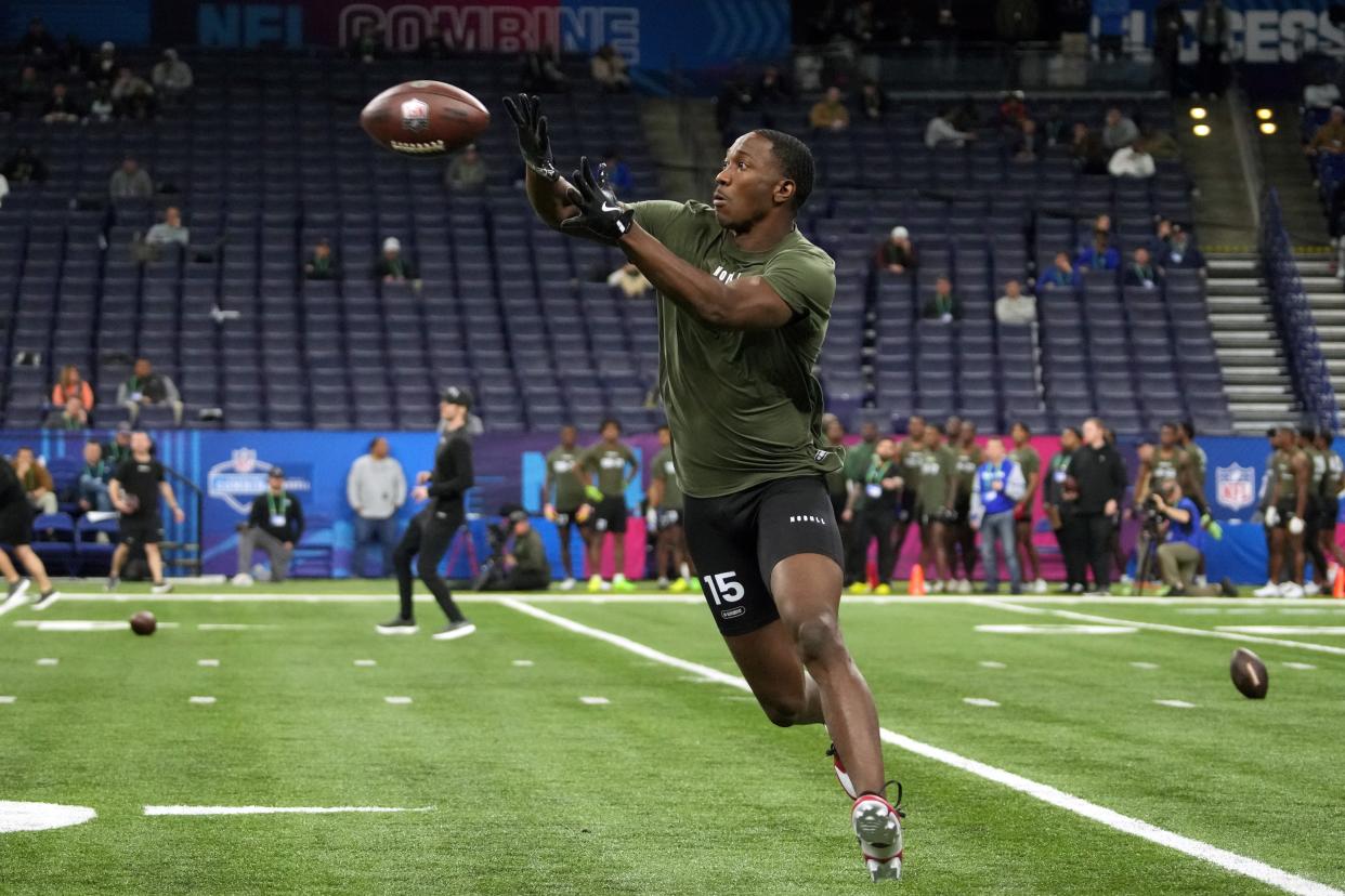 Mar 1, 2024; Indianapolis, IN, USA; Notre Dame defensive back Cam Hart (DB15) works out during the 2024 NFL Combine at Lucas Oil Stadium.