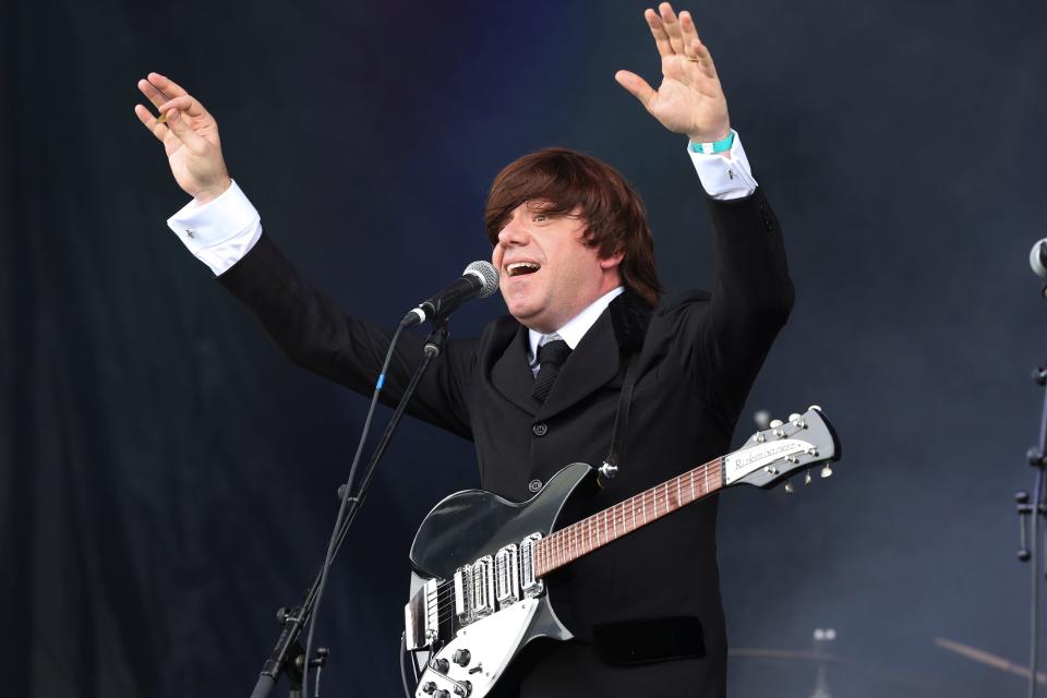 Beatles tribute performers Rubber Soul entertain the crowd during the Abbey Road on the River festival at Big Four Station Park in Jeffersonville.May 23, 2019