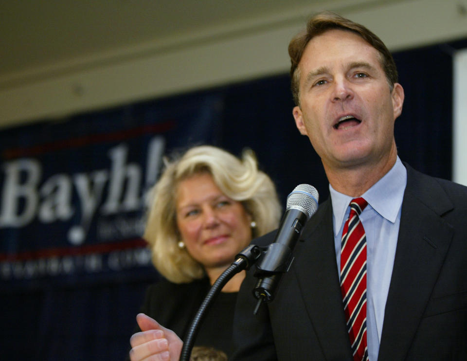 FILE - This Nov. 4, 2004 file photo shows Susan Bayh with husband Sen. Evan Bayh, D-Ind., in Indianapolis. A family spokesman said Saturday, Feb. 6, 2021 that Susan Bayh died Friday night in McLean Va. Bayh was Indiana’s first lady for eight years after her husband, Democrat Evan Bayh, won election to the first of two terms as governor in 1988.(AP Photo/Michael Conroy, FILE)