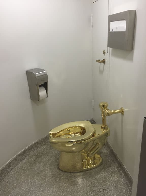 A fully functioning solid gold toilet, made by Italian artist Maurizio Cattelan, is going into public use at the Guggenheim Museum in New York on September 15, 2016.