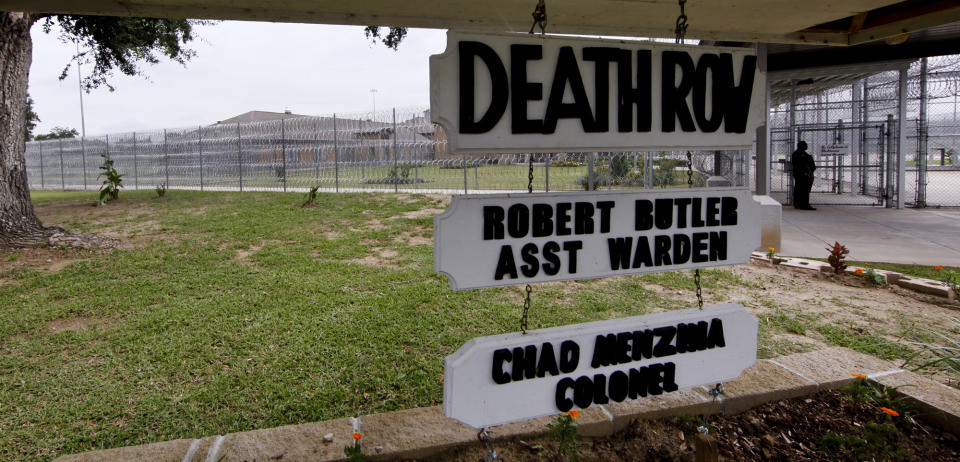 FILE - A sign hangs at the Death Row building at the Louisiana State Penitentiary, Sept. 18, 2009 in Angola, La. Louisiana Gov. Jeff Landry on Wednesday, Jan 31, 2024, hinted at his willingness to explore expanding the state’s methods of executing those on death row, saying that he is committed to upholding “contractual obligations” between the state and victims’ families after the death penalty has been handed down in court. ( AP Photo/Judi Bottoni, File )